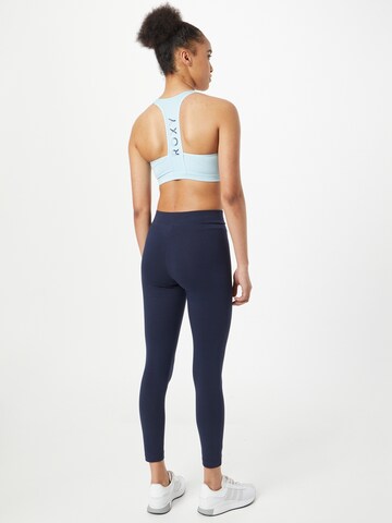 Skinny Pantalon de sport Champion Authentic Athletic Apparel en bleu