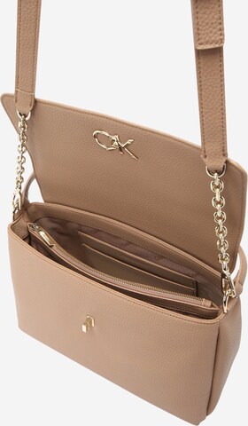 Borsa a mano di Calvin Klein in beige