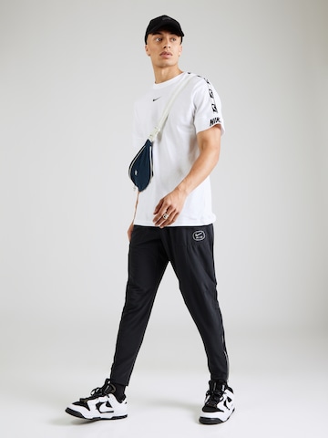 Nike Sportswear Štandardný strih Nohavice 'AIR' - Čierna