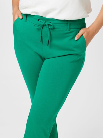 ONLY Carmakoma Regular Pants 'Goldtrash' in Green