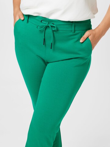 ONLY Carmakoma - regular Pantalón 'Goldtrash' en verde