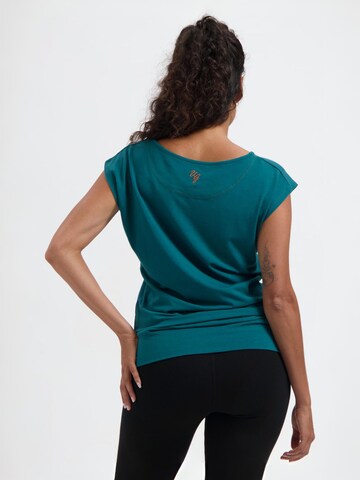 Urban Goddess Yoga & Activewear Sporttop 'Asana Yoga and Pilates' in Grün
