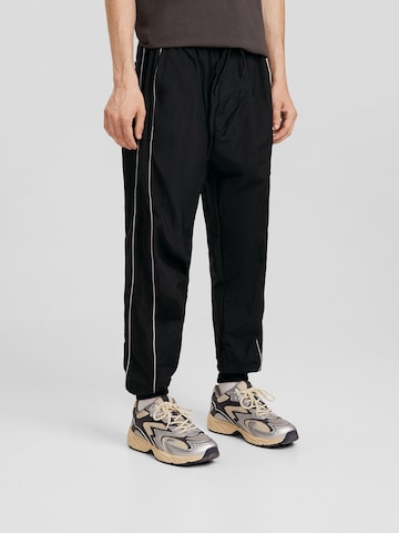 Bershka Regular Pants in Black: front