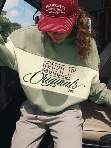 self. Sweatshirt in Groen