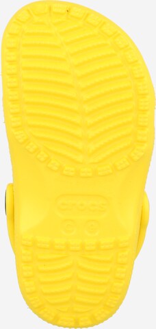 Crocs Sandals & Slippers in Yellow