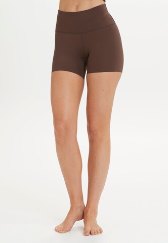 Athlecia Slim fit Workout Pants ' ALMY ' in Brown: front