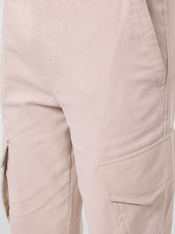 Pantalon 'TOMMY Kinder Cargo-Joggerhose' Tommy Life en gris