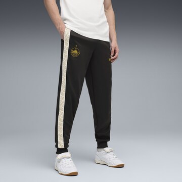 PUMA Tapered Sports trousers 'FC Red Bull Salzburg KING Anthem' in Black: front