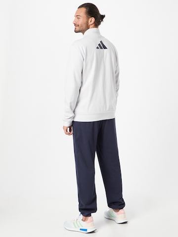 ADIDAS SPORTSWEAR Tracksuit 'Logo Graphic' in Blue