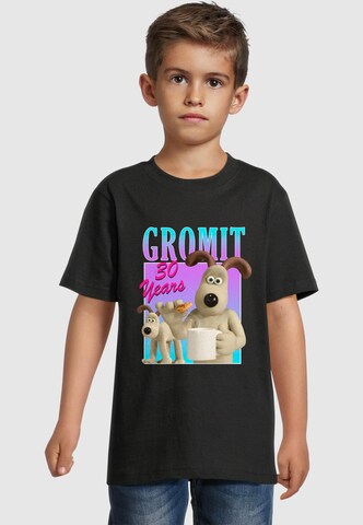 Merchcode T-Shirt 'Wallace and Gromit - Gradient Birthday' in Schwarz: Vorderseite