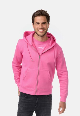 Veste de survêtement smiler. en rose