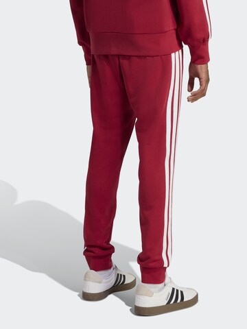 ADIDAS SPORTSWEAR Tapered Sportbroek 'Essential' in Bruin