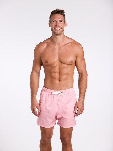Shorts de bain wavebreaker en rouge : devant