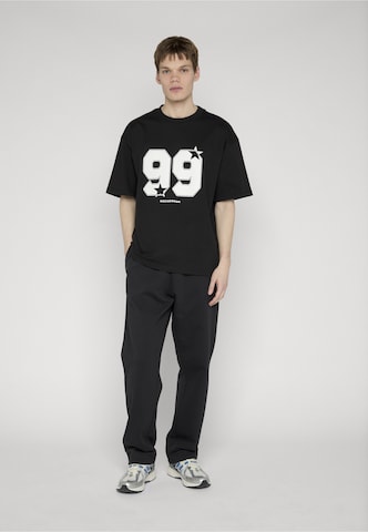 ROCAWEAR Regular Trousers 'Moola' in Black