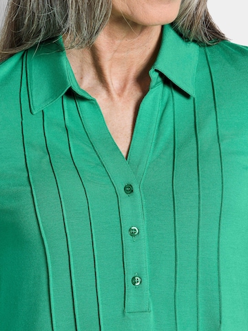 Goldner Tunika in Grün