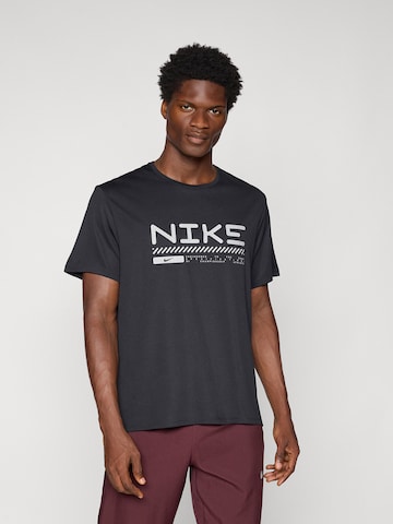 NIKE Funktsionaalne särk 'WINTER MILER', värv must: eest vaates
