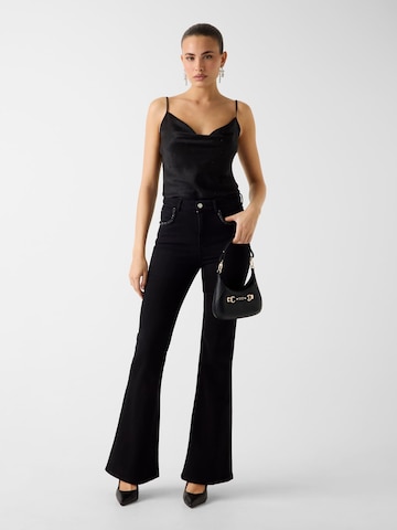 GUESS Tapered Jeans in Blue