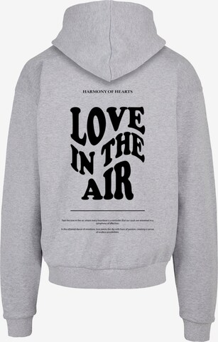 Merchcode Sweatshirt 'Love In The Air' in Grey
