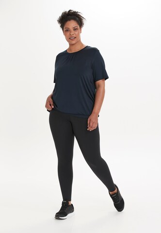 Q by Endurance Skinny Leggings in Black