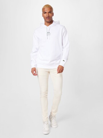 Sweat-shirt LACOSTE en blanc