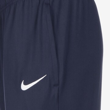 Skinny Pantaloni per outdoor di NIKE in blu