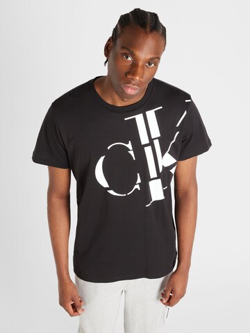 Calvin Klein Jeans - Camiseta en negro: frente