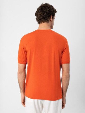 Antioch Bluser & t-shirts i orange