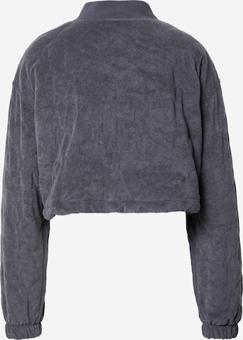 Nike Sportswear - Chaqueta de entretiempo en gris