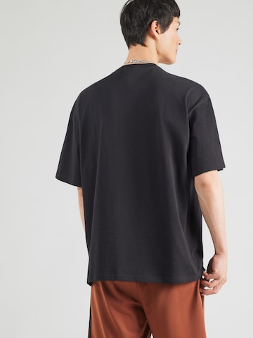 ADIDAS ORIGINALS Särk 'Ess', värv must: tagant vaates