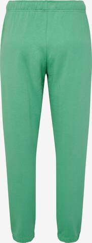 Effilé Pantalon de sport Hummel en vert