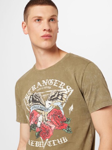 Key Largo T-Shirt 'STRANGE' in Grün