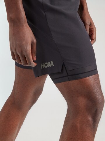 HOKA Regular Спортен панталон 'GLIDE 7' в черно