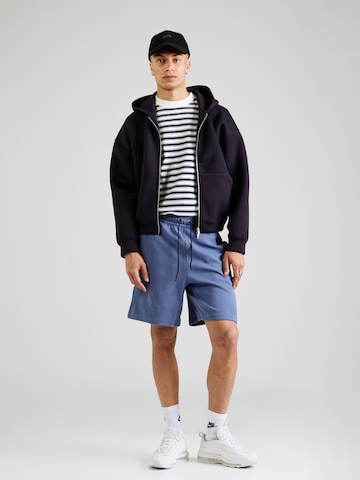 Nike Sportswear Loosefit Broek 'FLC' in Blauw