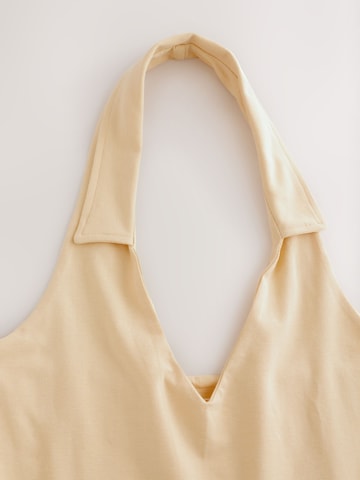 Top di Next in giallo