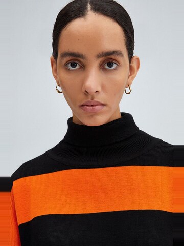 Touché Privé Sweater in Black