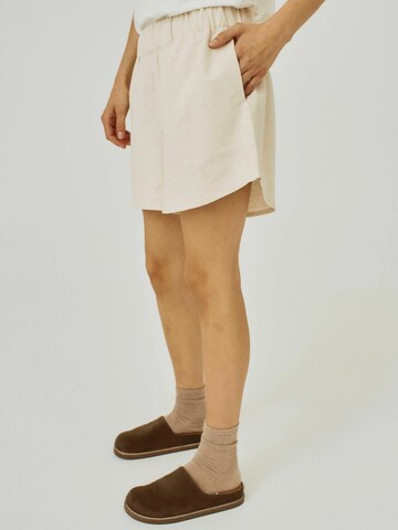 NORR Loose fit Trousers in Beige: front