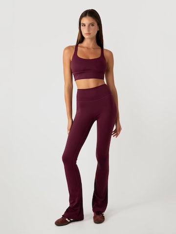 YO-GAYA Flared Leggings in Red: front