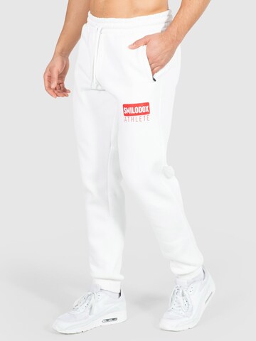 Effilé Pantalon de sport 'Athlete' Smilodox en blanc