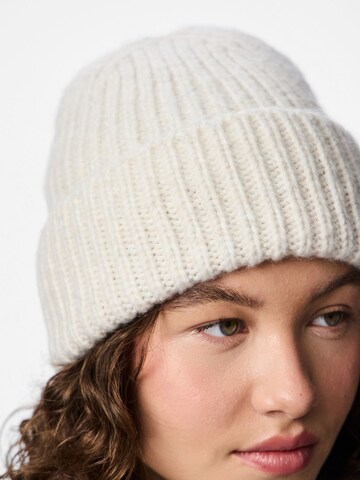 Bonnet PIECES en blanc