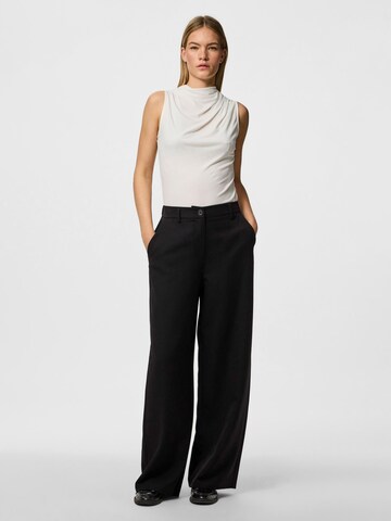 Wide leg Pantaloni 'Kamil' di PIECES in nero