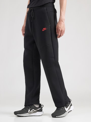 Nike Sportswear Loosefit Housut 'TECH FLC' värissä musta