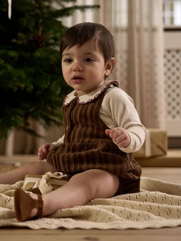 Lil'Atelier - Pijama entero/body en beige: frente
