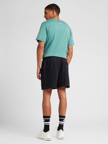 Nike Sportswear Loosefit Kalhoty 'Club' – černá