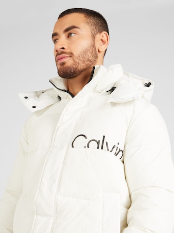 Calvin Klein Jeans Prehodna jakna 'Essential' | bela barva