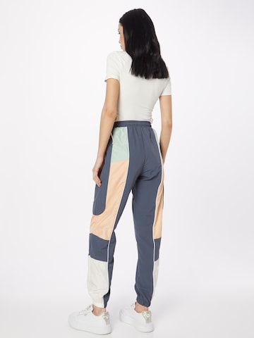 Effilé Pantalon ELLESSE en bleu