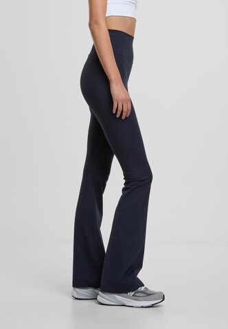 Flared Pantaloni sportivi di Aim'n in blu