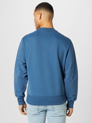 Sweat-shirt Calvin Klein Jeans en bleu