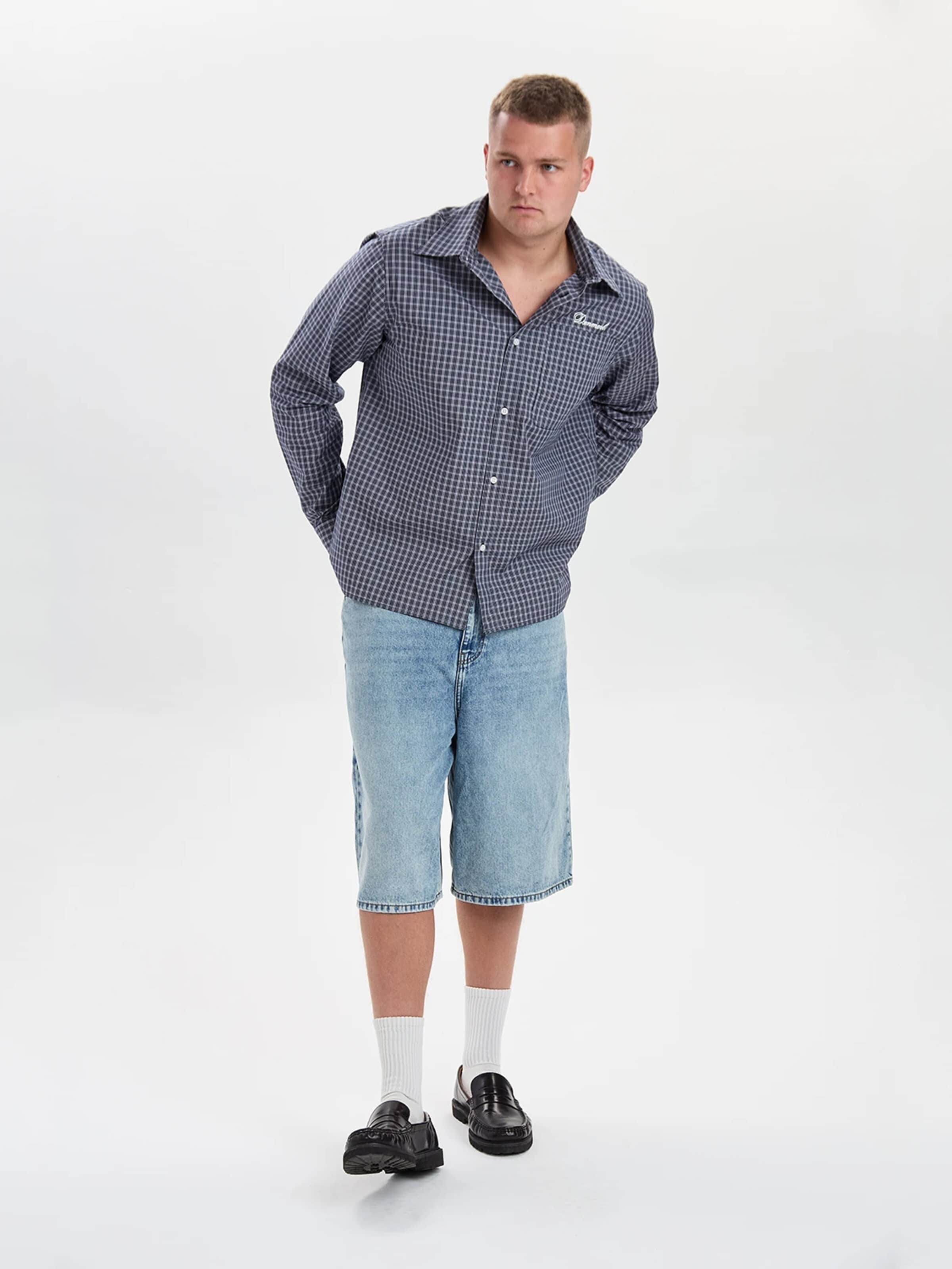 Dxnmxrk Szeroka nogawka Jeansy 'DXHarri Blue Wide Fit Denim Shorts' w kolorze niebieski: przód