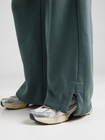 NIKE Wide leg Παντελόνι 'Phoenix Fleece' σε πράσινο