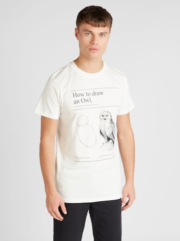 DEDICATED. T-shirt 'Stockholm How to Draw an Owl' i vit: framsida
